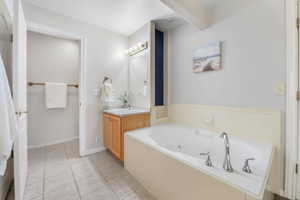 Primary bedroom with jetted tub