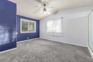 Primary suite w/ vaulted ceiling