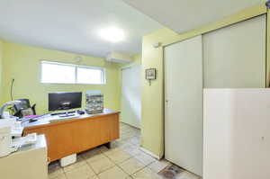 Office space with light tile patterned floors