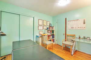 Office space with light wood-style floors