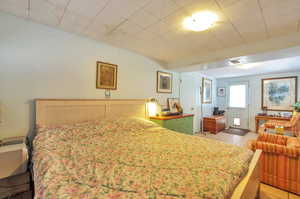 Bedroom featuring light tile patterned flooring