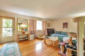 Living area featuring light wood-style floors