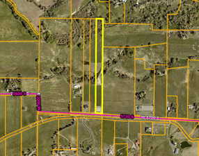 Aerial plat of property's location featuring property parcel outlined