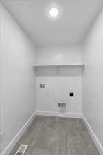 Laundry room with hookup for a washing machine and hookup for an electric dryer