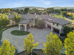 View of subject property with mountains