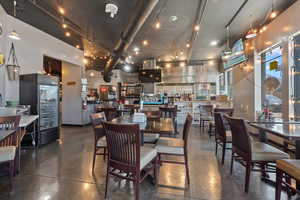 Dining area with finished concrete floors
