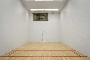 Two handball or raquetball courts in the breezeway between buildings