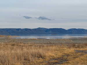 View of mountain background featuring a large body of water
