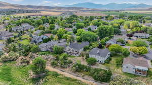 Aerial view of residential area with a mountainous background
