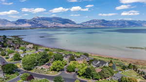 Aerial view of residential area with a water and mountain view