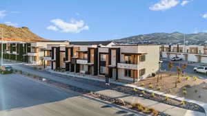 View of building exterior featuring a mountain view