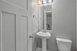 Bathroom with toilet and a sink