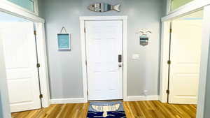 Cottage entryway looking toward the exit from the stairs