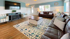 Living Room with electric fireplace, smart TV and DVD player