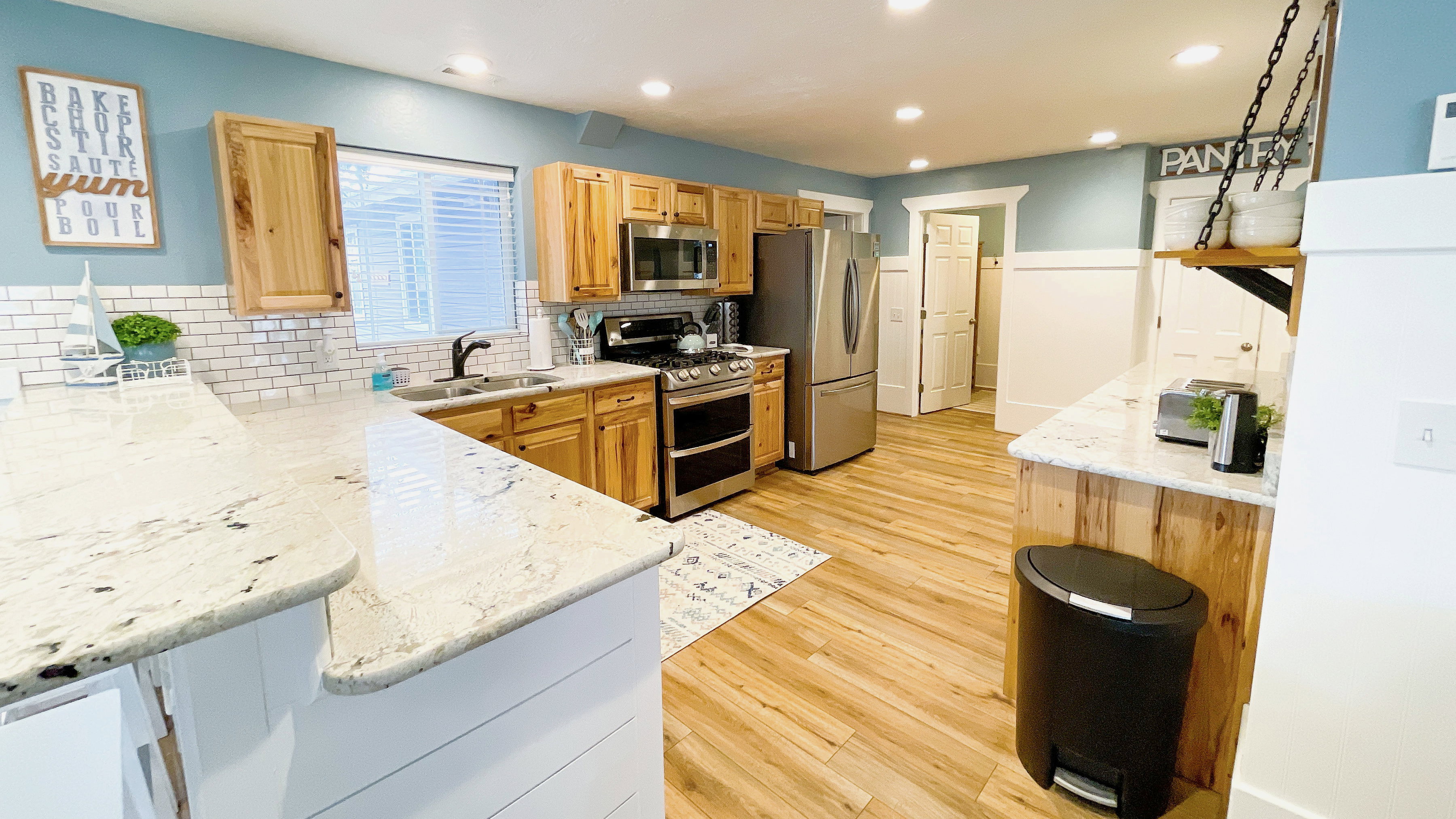 Fully stocked kitchen includes a split double oven
