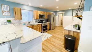 Fully stocked kitchen includes a split double oven