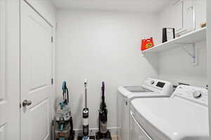 Laundry area upstairs convenient to all bedrooms.  Finished with a shelf and baseboards.