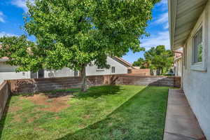 View of fenced backyard