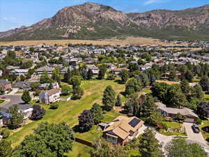 Aerial overview of property's location featuring nearby suburban area