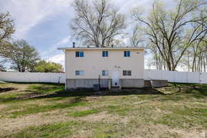Rear view of house with entry steps
