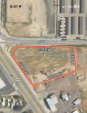 Aerial view of property's location with property parcel outlined