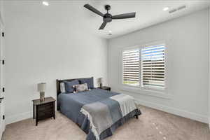 Bedroom with carpet, recessed lighting, and a ceiling fan