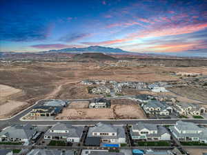 Aerial view of residential area with a mountain backdrop