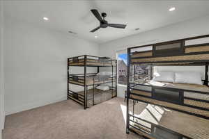 Unfurnished bedroom with carpet floors, recessed lighting, and a ceiling fan