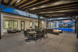 View of patio featuring an outdoor living space, outdoor dining area, and an outdoor pool