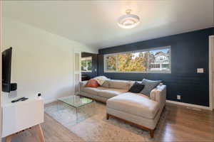 Living area featuring wood finished floors
