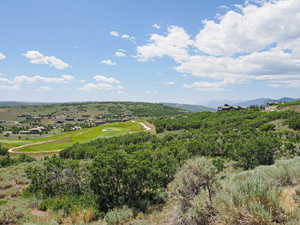 Bird's eye view of a golf club and mountains