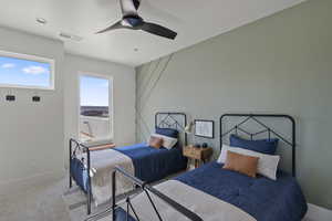 Bedroom featuring carpet flooring and ceiling fan