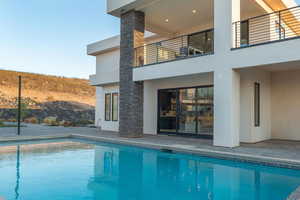 Outdoor pool with a patio area