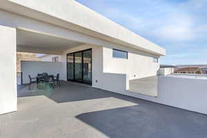 View of patio featuring outdoor dining area