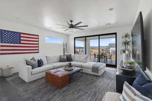 Living room featuring ceiling fan and recessed lighting