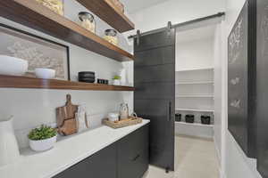Washroom featuring a barn door