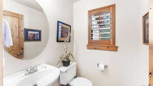 Bathroom featuring a sink and toilet