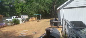 View of yard with a shed
