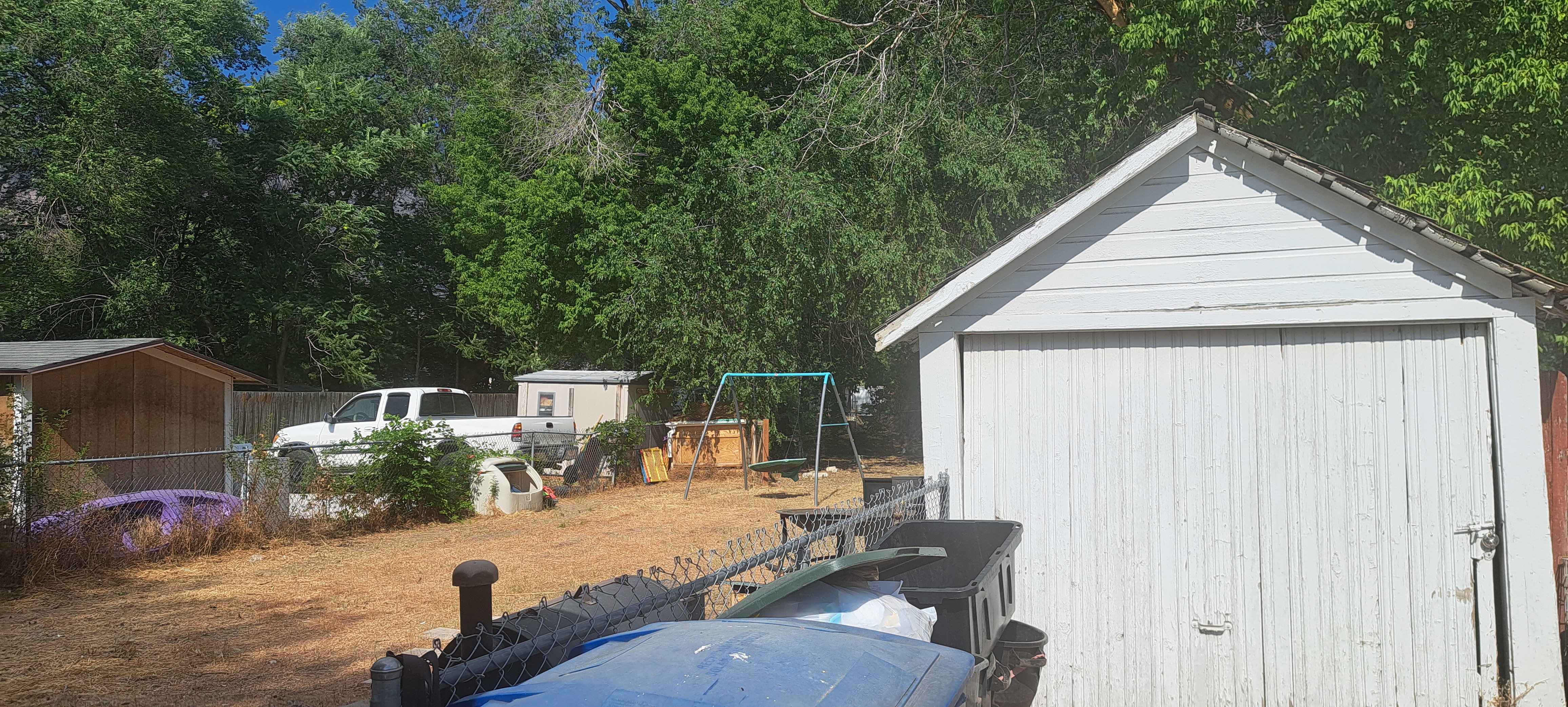 View of yard with a storage shed