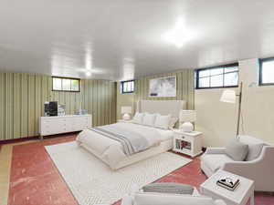 Bedroom featuring wallpapered walls