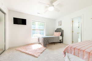 Bedroom featuring carpet flooring and ceiling fan