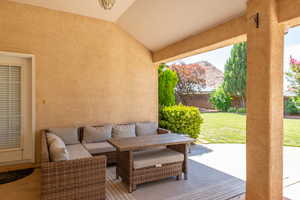 View of patio featuring an outdoor hangout area