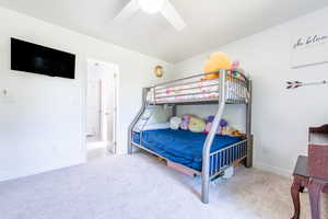 Bedroom with carpet and ceiling fan