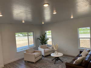 Bright and airy living room  plenty of natural light, and recessed lighting