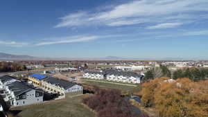 Aerial view of residential area featuring mountains