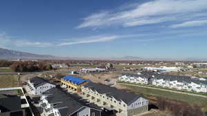 Aerial view of residential area with mountains