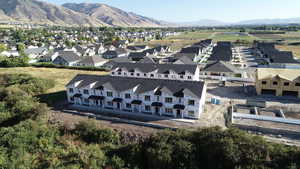 Aerial view of residential area with mountains