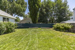 View of fenced backyard
