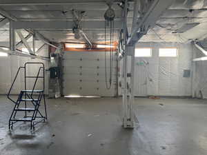 View interior warehouse space and G.L. doors.