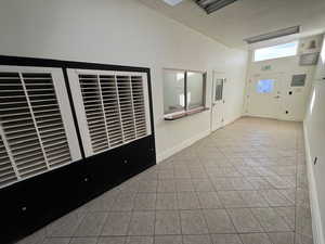 Spare room featuring tile patterned floors